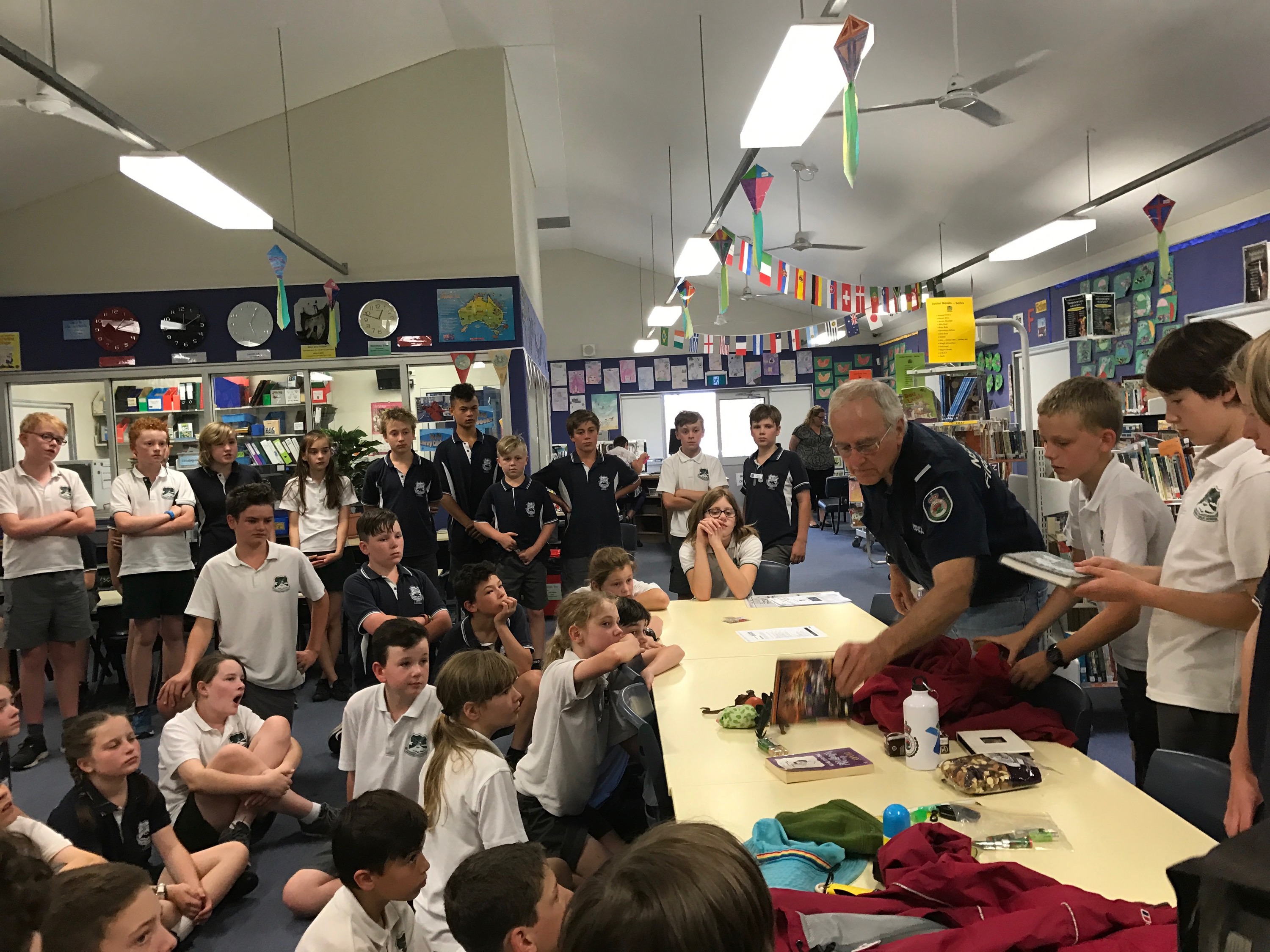 Warrimoo Public School students and NSW Rural Fire Service checking emergency kit